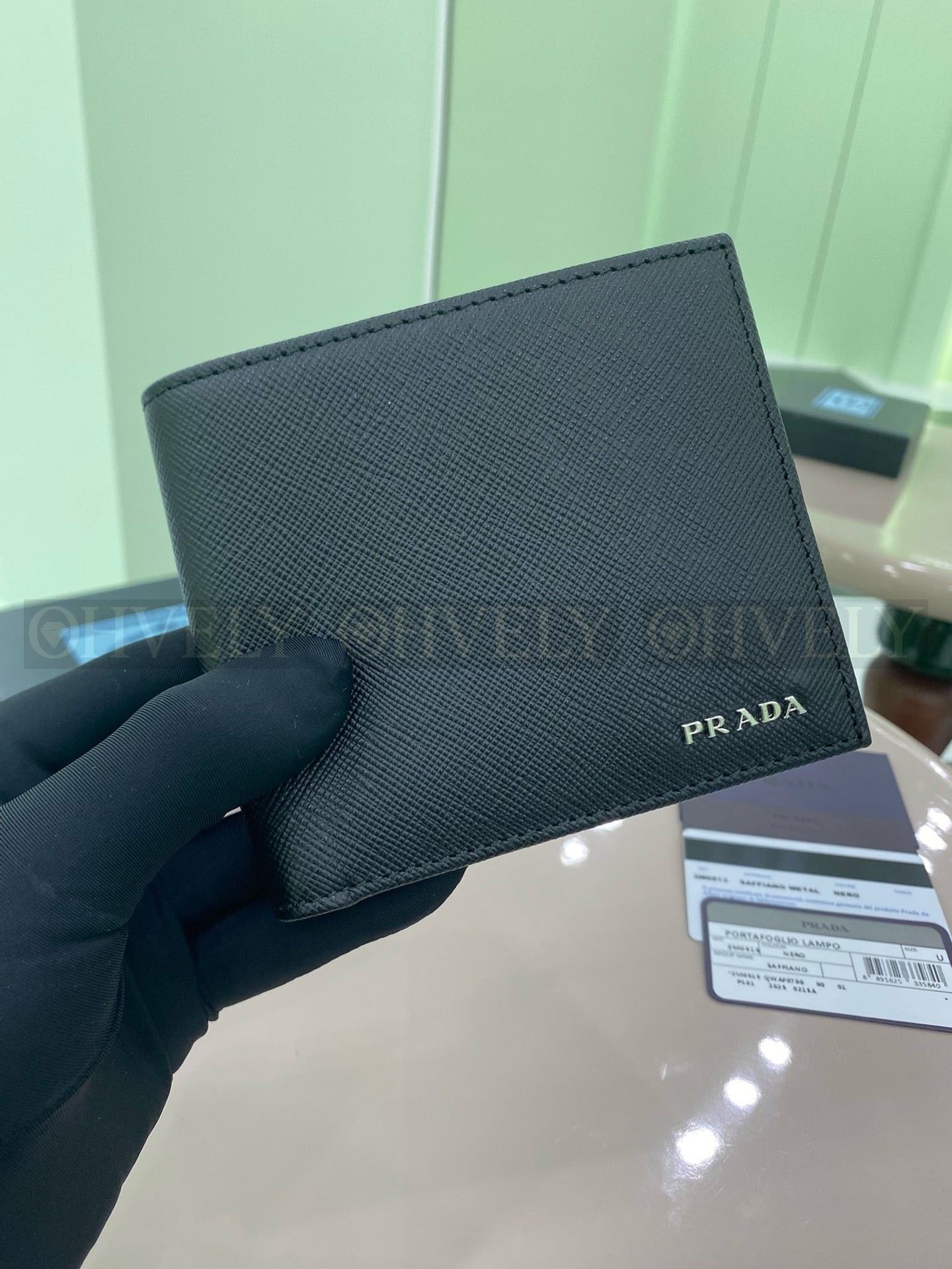 프라다 메탈 로고 사피아노 반지갑 상품 썸네일